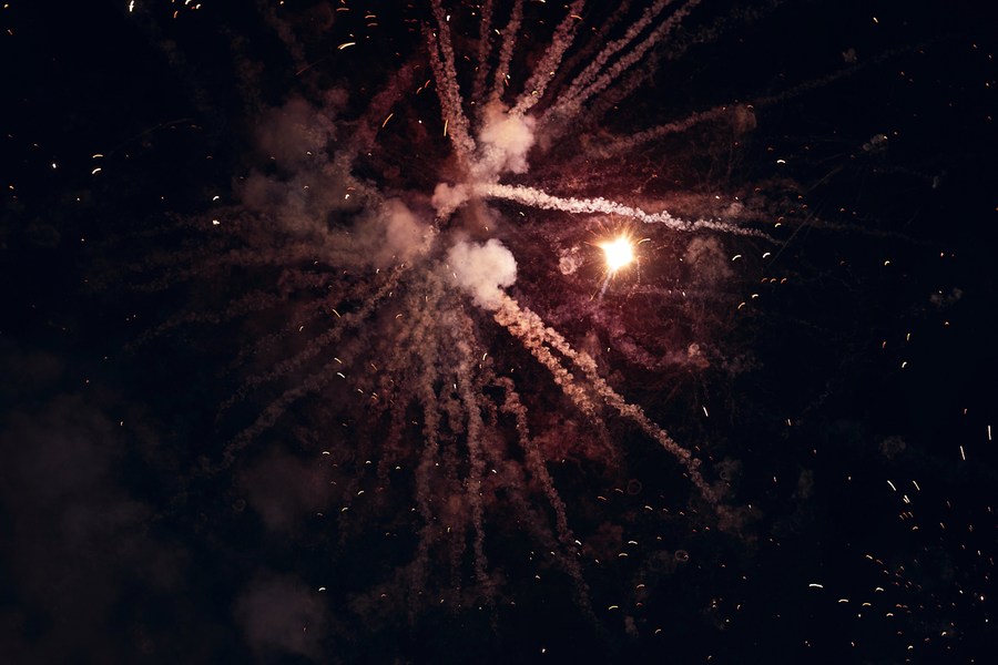 Fireworks illuminating a dark sky